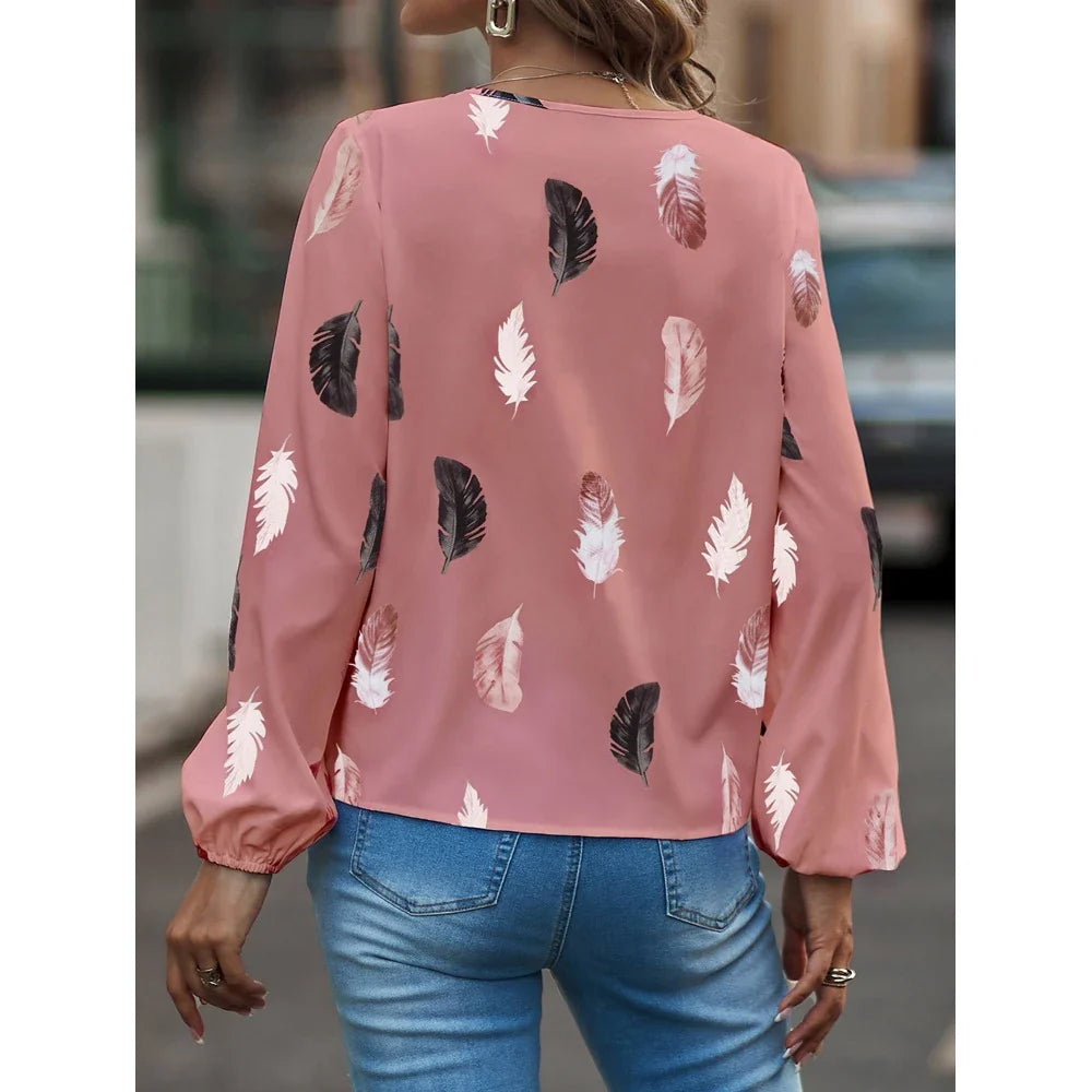 Blusa fluida con stampa piume e maniche a palloncino "Liliana"