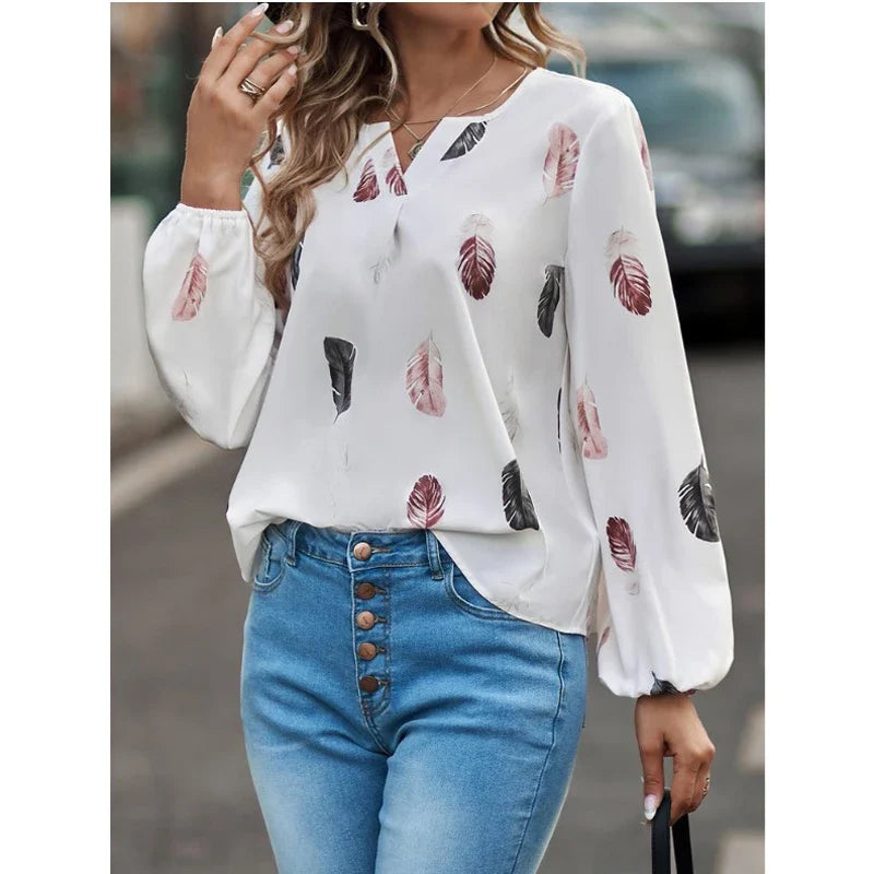 Blusa fluida con stampa piume e maniche a palloncino "Liliana"