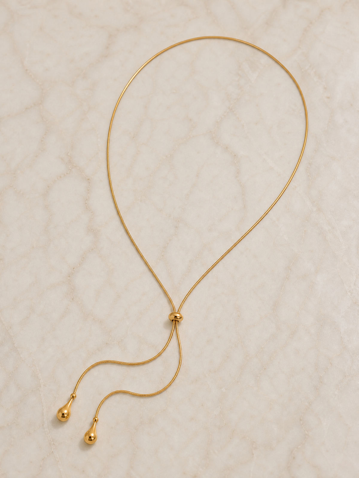 Collana a cravatta con gocce dorate "Thaïs"